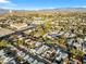 Scenic aerial view showcasing the neighborhood layout, nearby mountains, and water tower at 620 Avenue H, Boulder City, NV 89005