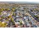 Residential neighborhood aerial view with a mix of single-Gathering homes and mature trees in a well-established community at 620 Avenue H, Boulder City, NV 89005