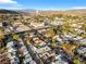Picturesque aerial view of the neighborhood and nearby desert landscape and water tower at 620 Avenue H, Boulder City, NV 89005