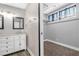 Bathroom with double sink vanity, large mirror and walk-in closet at 620 Avenue H, Boulder City, NV 89005