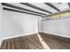 Bright room with modern design including hardwood floors and decorative ceiling beams at 620 Avenue H, Boulder City, NV 89005