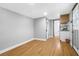 Hallway with an adjacent kitchenette area and white cabinets at 620 Avenue H, Boulder City, NV 89005