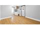Entryway featuring hardwood floors leading to a partial kitchen and bathroom at 620 Avenue H, Boulder City, NV 89005