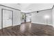 Spacious living room with hardwood floors, natural light, and neutral-toned walls at 620 Avenue H, Boulder City, NV 89005
