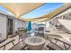 Inviting pool area featuring an outdoor fire pit and comfortable seating, perfect for relaxation and entertainment at 620 Avenue H, Boulder City, NV 89005