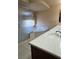 Bathroom featuring a soaking tub, tiled floors and double sinks at 6277 Mustang Spring Ave, Las Vegas, NV 89139