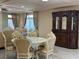 Charming dining room featuring a marble table, ornate chairs, and a classic hutch, perfect for Gathering gatherings at 6277 Mustang Spring Ave, Las Vegas, NV 89139