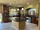Modern kitchen with a granite island and lots of counter space at 6277 Mustang Spring Ave, Las Vegas, NV 89139
