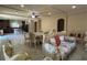 Open-concept living area with tile flooring, and views of the kitchen at 6277 Mustang Spring Ave, Las Vegas, NV 89139