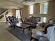 Formal living room featuring ornate furniture, fireplace and abundant natural light at 6277 Mustang Spring Ave, Las Vegas, NV 89139