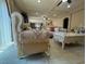 This living room has large windows at 6277 Mustang Spring Ave, Las Vegas, NV 89139