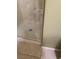 Close-up of the shower with glass door and tile flooring at 6277 Mustang Spring Ave, Las Vegas, NV 89139