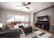 Inviting living room with a ceiling fan and comfortable seating area at 6333 Sterling Ranch Way, North Las Vegas, NV 89081