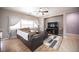 Inviting living room with a ceiling fan and comfortable seating area at 6333 Sterling Ranch Way, North Las Vegas, NV 89081