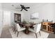 Formal dining room with modern furnishings, stylish decor, and plenty of space for entertaining at 6636 Surfbird St, North Las Vegas, NV 89084