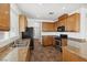 Functional kitchen featuring stainless steel appliances, plentiful cabinet space, and durable countertops at 6636 Surfbird St, North Las Vegas, NV 89084