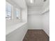 A walk-in closet with carpet and shelving at 6636 Surfbird St, North Las Vegas, NV 89084