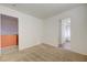 Bedroom features neutral carpet, white walls, and doorways leading to other areas of the home at 7528 Golden Yucca Dr, Las Vegas, NV 89147