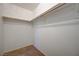 Spacious walk-in closet with carpet and a wooden clothes rack at 7528 Golden Yucca Dr, Las Vegas, NV 89147