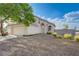 Inviting single-story home with low maintenance desert landscaping and attached two-car garage in a corner location at 7528 Golden Yucca Dr, Las Vegas, NV 89147
