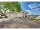 Beautiful one-story home with low maintenance desert landscaping and two-car garage, located on a corner lot at 7528 Golden Yucca Dr, Las Vegas, NV 89147