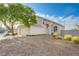 Charming one-story home boasting desert landscaping, two-car garage, and convenient corner lot location at 7528 Golden Yucca Dr, Las Vegas, NV 89147