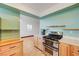 Clean kitchen features stainless appliances, light wood cabinets, and bright, airy lighting at 7528 Golden Yucca Dr, Las Vegas, NV 89147