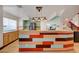 Stylish kitchen features wooden counters, sleek appliances and a colorful backsplash at 7528 Golden Yucca Dr, Las Vegas, NV 89147