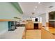 Spacious kitchen with modern appliances, light wood cabinets, and light-filled rooms at 7528 Golden Yucca Dr, Las Vegas, NV 89147