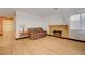 Comfortable living room with a cozy fireplace and modern flooring at 7528 Golden Yucca Dr, Las Vegas, NV 89147