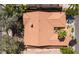 Aerial view of the home's tile roof, surrounded by trees and landscaping at 7609 Slide Rock Ave, Las Vegas, NV 89113
