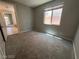 Bedroom with bright window for natural light at 7609 Slide Rock Ave, Las Vegas, NV 89113