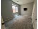 Bedroom features large window and neutral paint at 7609 Slide Rock Ave, Las Vegas, NV 89113