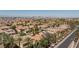 Wide aerial shot of a community with beautiful homes and mature landscaping at 7609 Slide Rock Ave, Las Vegas, NV 89113