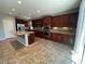 Gourmet kitchen features granite counters, stainless appliances, and abundant cabinetry at 7609 Slide Rock Ave, Las Vegas, NV 89113