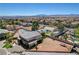 Home featuring a spacious backyard with pool and desert landscaping at 7736 Tioga Ridge Ct, Las Vegas, NV 89117