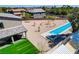Aerial view of backyard with desert landscaping, lap pool, and outdoor seating area at 7736 Tioga Ridge Ct, Las Vegas, NV 89117