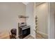 Kitchen area with stainless steel oven and access to pantry storage at 7736 Tioga Ridge Ct, Las Vegas, NV 89117