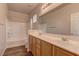 Bathroom featuring double sinks, updated vanity, and a shower-tub combination at 7919 Dexter Falls St, Las Vegas, NV 89149