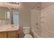Bathroom with a bathtub and shower combination and a single sink vanity at 7919 Dexter Falls St, Las Vegas, NV 89149