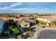 Beautiful single-story home featuring desert landscaping, a three-car garage, and a well-manicured front yard at 8298 W Agate Ave, Las Vegas, NV 89113