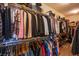 Walk-in closet providing generous storage with racks for hanging clothes and organizing belongings at 8298 W Agate Ave, Las Vegas, NV 89113