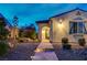 Charming home with beautiful desert landscaping and a welcoming front entrance at 8298 W Agate Ave, Las Vegas, NV 89113