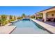 Backyard swimming pool and manicured garden, perfect for outdoor living at 8298 W Agate Ave, Las Vegas, NV 89113