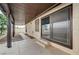 The covered back patio features direct access to the yard and home, with an expansive paved area at 8412 Mulcahy Ave, Las Vegas, NV 89145