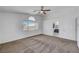 Bedroom with ceiling fan, neutral carpet and white walls at 8529 Gold Flash Ave, Las Vegas, NV 89129