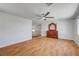 Spacious second-story bedroom featuring laminate floors and a ceiling fan at 8529 Gold Flash Ave, Las Vegas, NV 89129