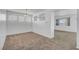Neutral dining room area offering modern light fixture and many windows at 8529 Gold Flash Ave, Las Vegas, NV 89129