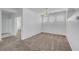 Neutral dining room area offering a view to the kitchen at 8529 Gold Flash Ave, Las Vegas, NV 89129