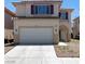 Charming two-story home featuring a two-car garage and desert landscaping at 8529 Gold Flash Ave, Las Vegas, NV 89129
